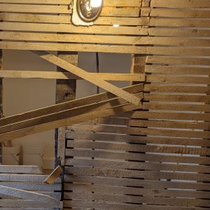 Old wood lath wall about to be torn out